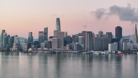 Aerial-of-San-Francisco-Financial-District-with-golden-sky-at-sunrise