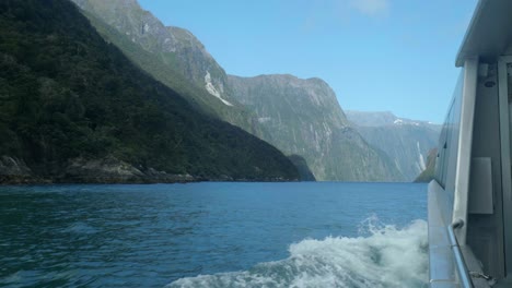Maritime-marvel:-Boat-gracefully-enters-Milford-Sound-in-captivating-stock-footage