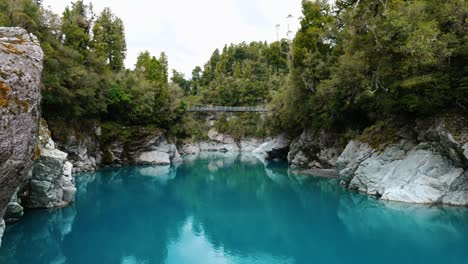 Bright-skies-over-Hokitika-Gorge:-Captivating-stock-footage-capturing-the-vibrant-beauty-of-this-iconic-New-Zealand-landscape