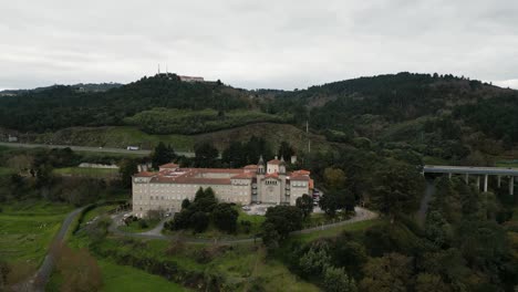 Drone-establishing-shot-of-Catholic-seminary-religious-school-in-Ourense-Spain