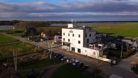 Drone-forward-to-Hertog-Jan-beer-brewery-at-Arcen-Limburg-the-Netherlands