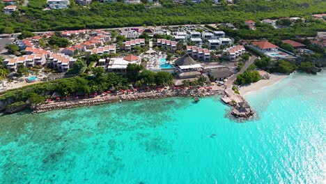 Panoramic-aerial-orbit-around-estate-homes-looking-out-over-Karakter-beach-Curacao
