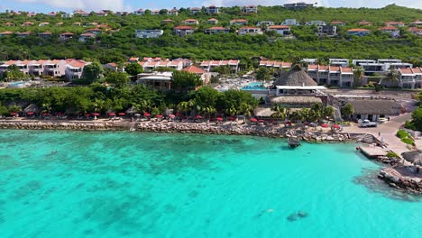 Aerial-establishing-view-of-Karakter-tropical-Caribbean-beach-in-Curacao-on-beautiful-sunny-day