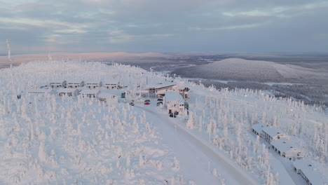 Aerial-view-around-the-Hotel-Iso-Syöte-resort,-on-top-of-Syote,-sunrise-in-Finland