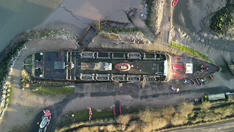Ghost-Ship-the-Duke-of-Lancaster-at-sunset---drone-top-down-decend---Mostyn,-Wales,-UK