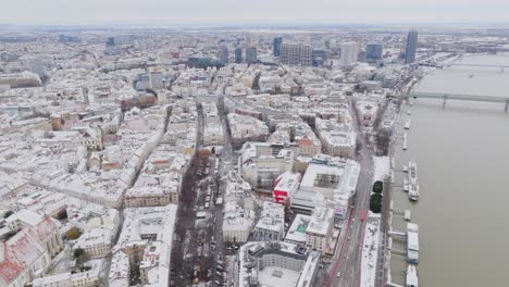 Aerial-drone-view-of-old-town-with-modern-buildings-of-Bratislava-down-town-in-winter