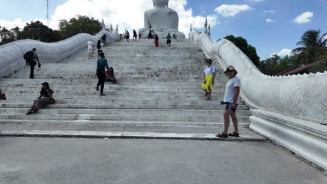 Tourists-visiting-the-Big-Buddha-at-Phuket,-Thailand