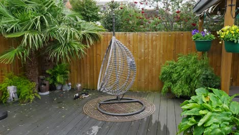 Minimalistic-English-garden-with-modern-decking-bamboo-plants-on-a-windy-breezy-day