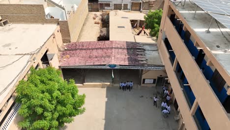 School-courtyard-in-Shahdadpur,-Sindh