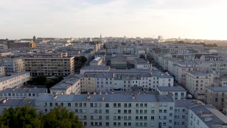 Dolly-right-drone-shot-viewing-city-Brest-in-France-at-sunset