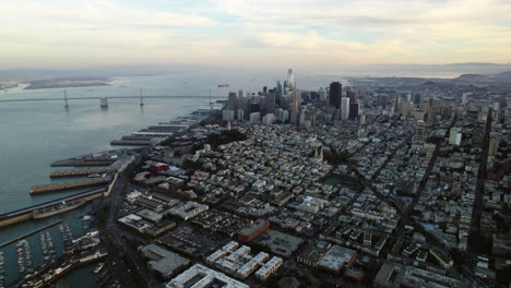 Aerial-view-overlooking-the-cityscape-of-San-Francisco,-partly-sunny-morning-in-USA