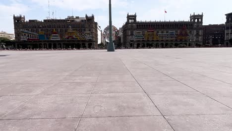 slow-motion-shot-of-a-totally-empty-zocalo-at-midday-in-mexico-city