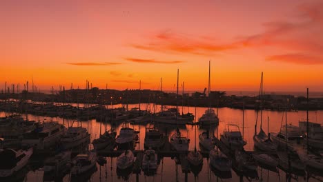 Moss-Landing-fishing-sailing-boat-jetty-marina-harbour-at-sunset