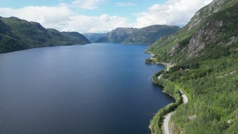 Vestfold-og-Telemark-Nature-and-Scenic-Road-along-Totak-Lake-in-Norway---Aerial-4k