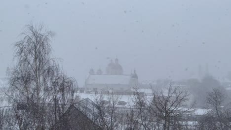 Heavy-Snowfall-Blanketing-the-Charming-Old-Town-Vilnius,-Lithuania