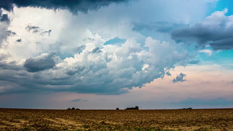 An-ominous-sky-timelapse-on-an-agricultural-field