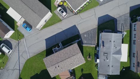 An-Aerial-Down-Looking-View-of-a-Well-Kept-Mobile,-Manufactured,-Prefab-Home-Park-of-Single-Wide-and-Double-Wide-Houses-on-a-Sunny-Day