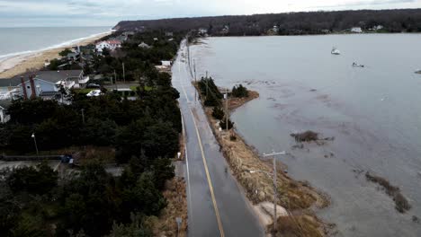 Drone-Footage-showing-the-rising-Floodwaters-waves-breach-cedar-beach-road-on-January-10th