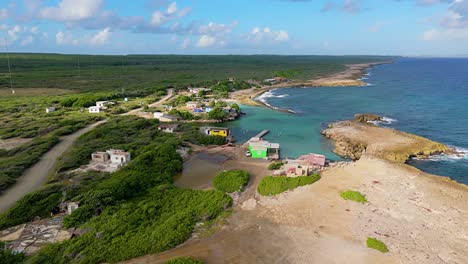 Aerial-establish-of-rugged-northside-beach-of-Kanoa-or-Canoa,-Curacao