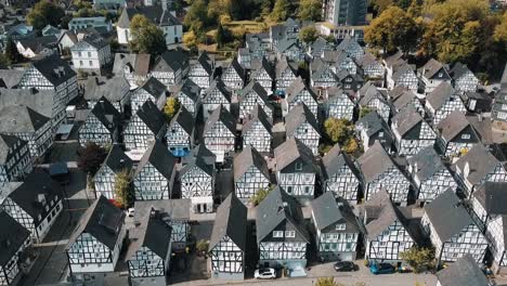 A-drone-flies-over-the-identical-houses-of-Freudenberg,-Germany