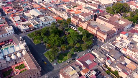 Drone-View-of-Park-and-old-church-in-Ibarra,-Ecuador