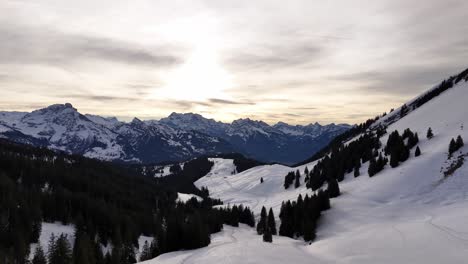 Over-View-of-Snow-Covered-Mountains-in-Europe,-Skiing-Slopes---Areal-Drone-Shot-Dolly-Shot