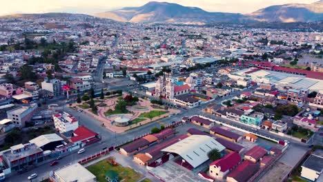 Aerial-View-of-city-and-old-church-in-Ibarra,-Ecuador