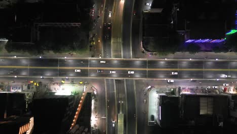 Rajkot-aerial-drone-view-close-up-seen-all-our-vehicles-are-going-over-the-bridge-car-bike-Trucks,-rickshaws-are-going