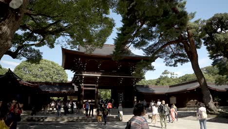 Tourists-Walking-Towards-Minamijinmon-Gate-Entrance-To-Main-Courtyard-At-Meji-Shrine