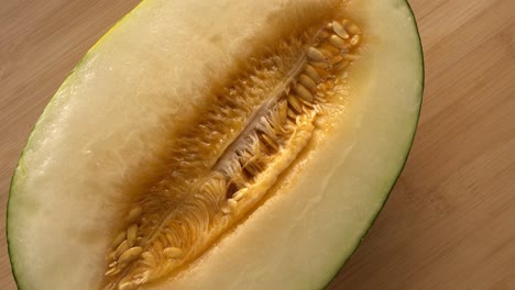 melon-cut-in-half-in-rotation