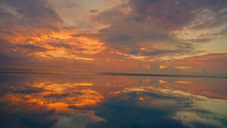 Picturesque-tropical-cloudscape-timelapse-reflecting-on-the-seaside-pool's-water