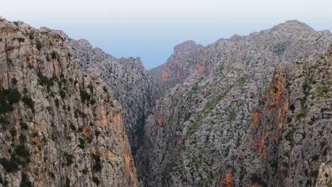 Spain-Mallorca,-Aerial-Footage-Of-Winding-High-Mountains