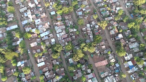 In-this-brief-4K-aerial-clip,-a-bird's-eye-view-captures-the-simplicity-and-charm-of-a-rural-township-outside-Pretoria,-South-Africa
