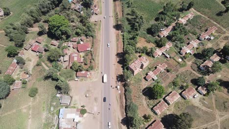 Traffic-on-African-countryside-road-in-Southern-Kenya-aerial-top-down