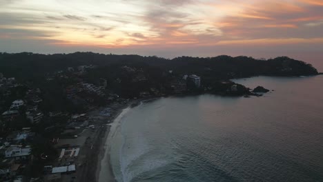 Sayulita-Mexico-town-in-riviera-Nayarit-travel-destination-for-surf-real-estate-land-for-sale-aerial-at-sunset