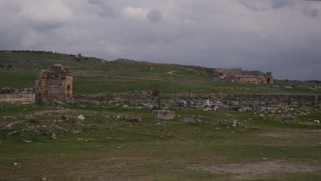 A-mountainside-with-the-Ancient-Theater-in-the-distance-in-Hierapolis