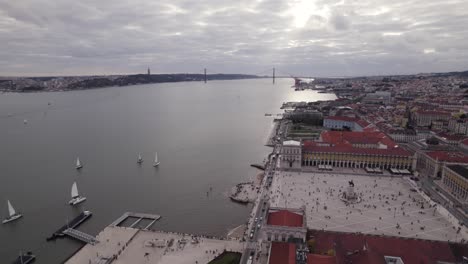 Lisbon's-Praça-do-Comércio-and-Tagus-River,-Portugal---Aerial-flyover