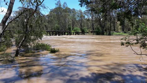 Drone-push-of-Goulburn-river-flooded-in-Victoria-low-shot
