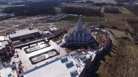 An-aerial-view-of-the-Shri-Swaminarayan-Mandir-in-Robbinsville-Twp,-NJ-on-a-sunny-day,-it-was-closed-for-the-day