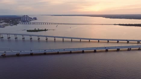 Cleveland-Avenue-and-Edison-Bridges-at-sunset,-Fort-Myers-in-Florida