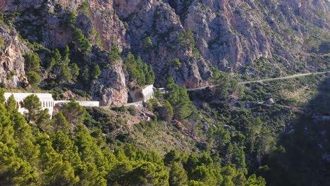 Road-On-The-Hillside-Passes-Through-Tunnels-In-Mallorca,-Spain