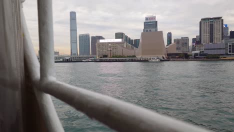 Shot-of-Hong-Kong-Cultural-Centre-in-TsimSha-Tsui-through-the-window-of-ship-in-a-cloudy-day-in-Hong-Kong