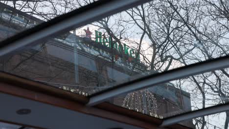 Looking-Out-Amsterdam-River-Boat-Cruise-Glass-Roof-At-Heineken-Building