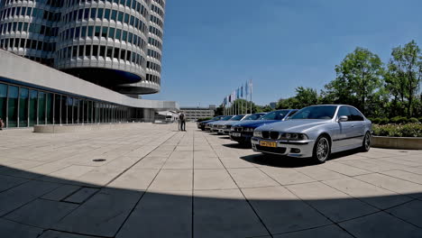 People-viewing-BMW-cars-at-museum-in-Munich,-Germany-during-50-year-celebrations