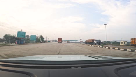POV-of-a-car-dash-cam-at-a-Toll-plaza-entry-at-a-Highway-in-India