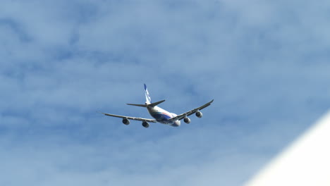 Flying-above-and-departing-from-the-Suvarnabhumi-Airport,-the-Nippon-Cargo-Airlines-is-on-its-way-to-it-next-destination-in-Southeast-Asia