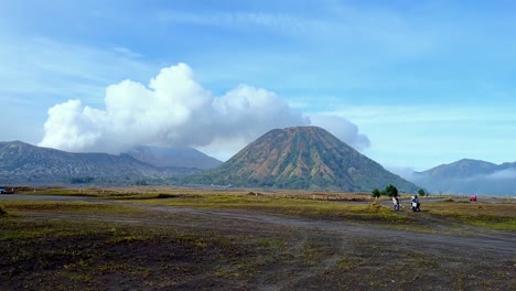 View-of-Bromo-Tengger-Semeru-National-Park-with-view-of-desert,-savanna-and-mountain-volcano-on-the-background