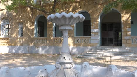 Elegant-colonial-fountain-at-Goolbai,-Karachi