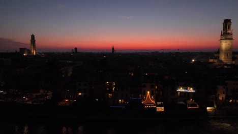 Aerial-lateral-Panning-Drone-Shot-of-Verona-Bell-Towers-Skyline-at-Sunset