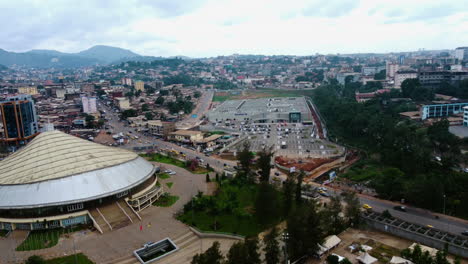 Aerial-view-approaching-the-PlaYce-Yaoundé-shopping-center-in-cloudy-Cameroon